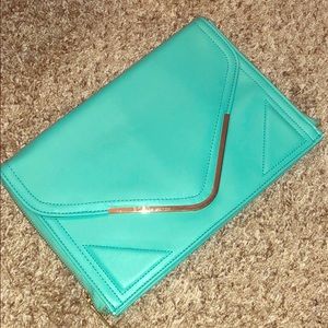 Large teal BCBG clutch
